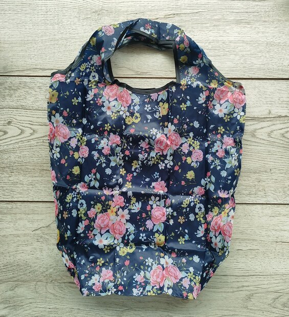 Bolsa Plegable Mediana Flores Fondo Azul